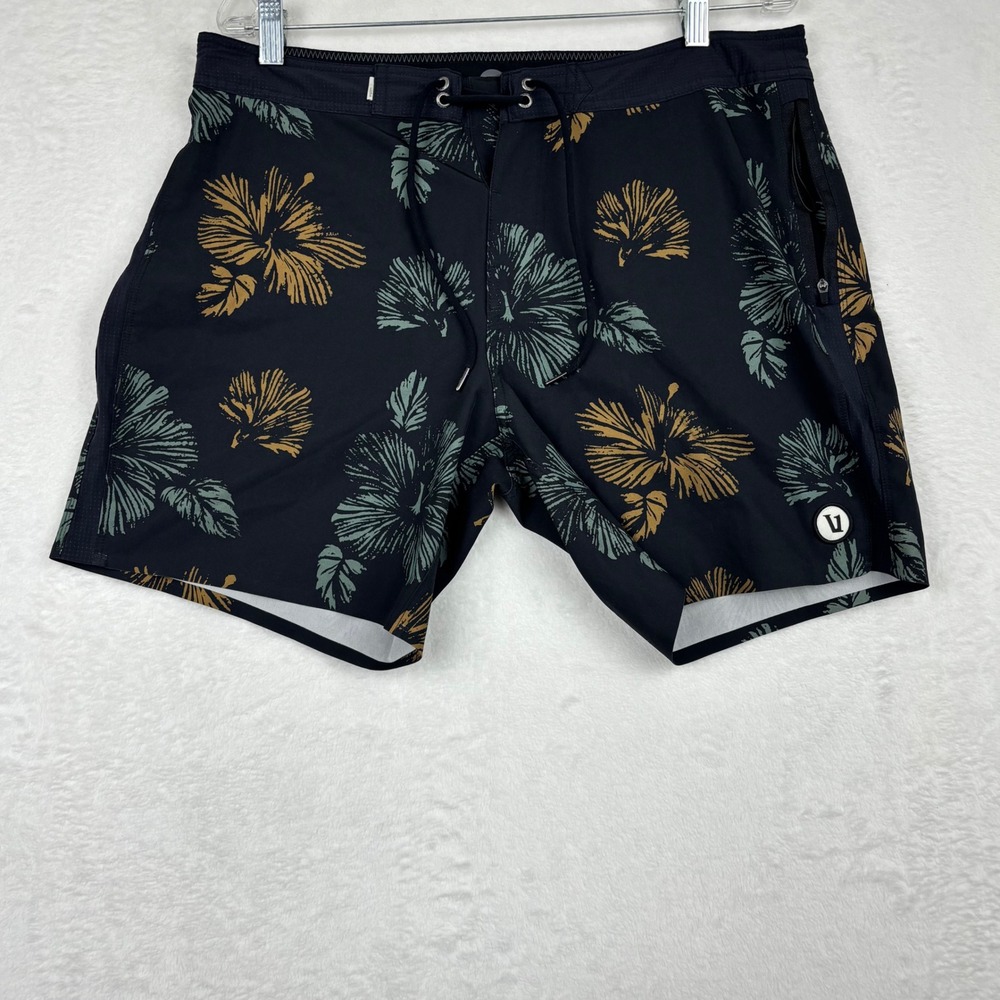 Vuori Black Floral Swim Board Shorts with Green and Gold Print